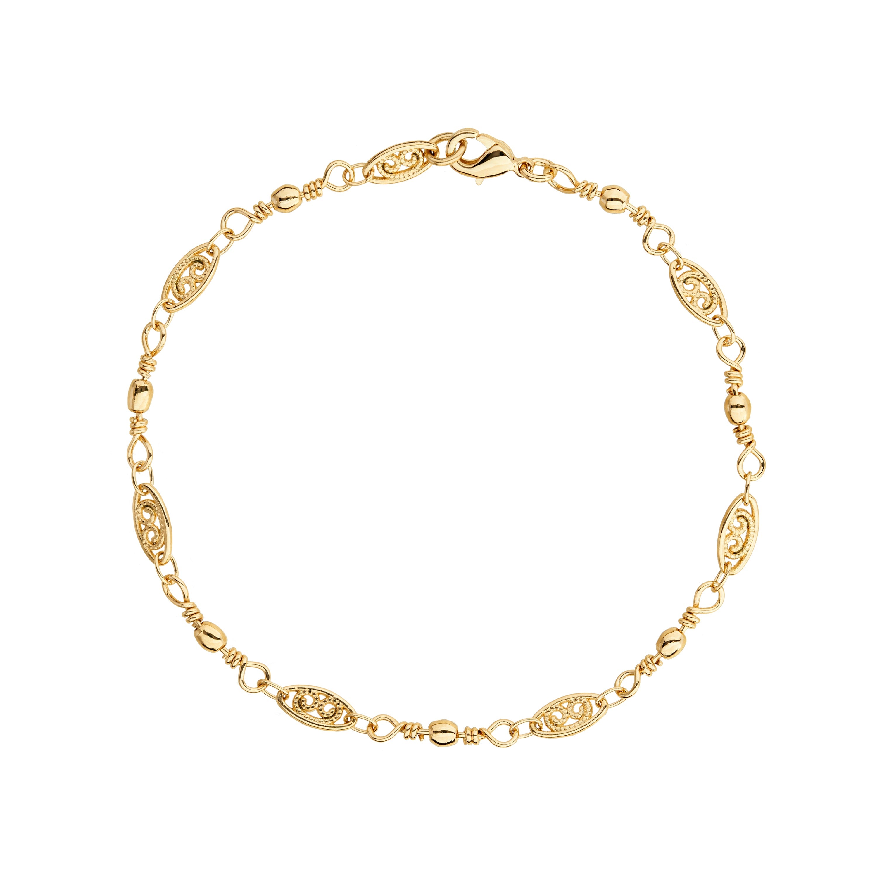 Delicate gold bracelet with ornate oval links and lobster clasp