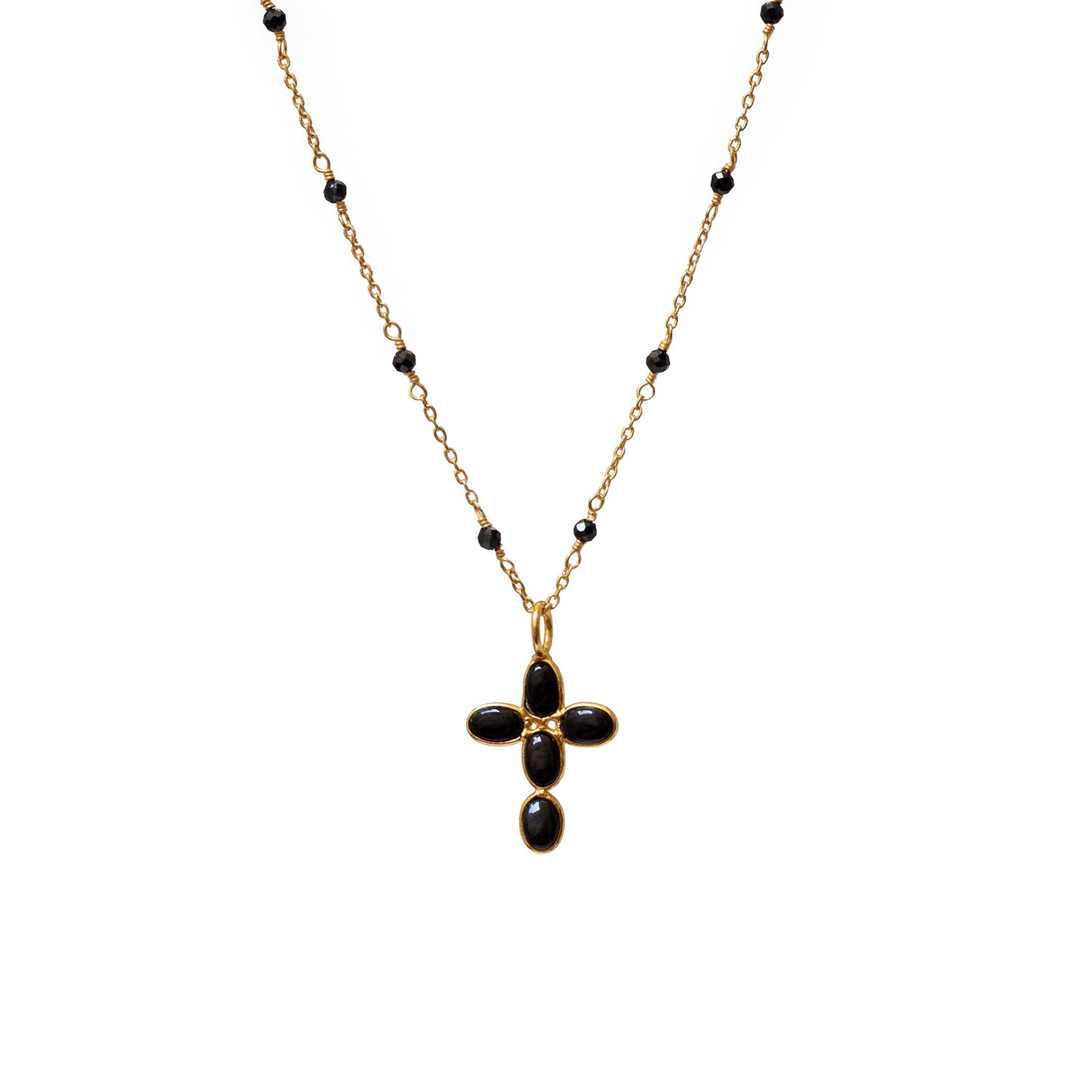 A gold-plated chain necklace featuring a small cross with black onyx stones and a black onyx rosary.