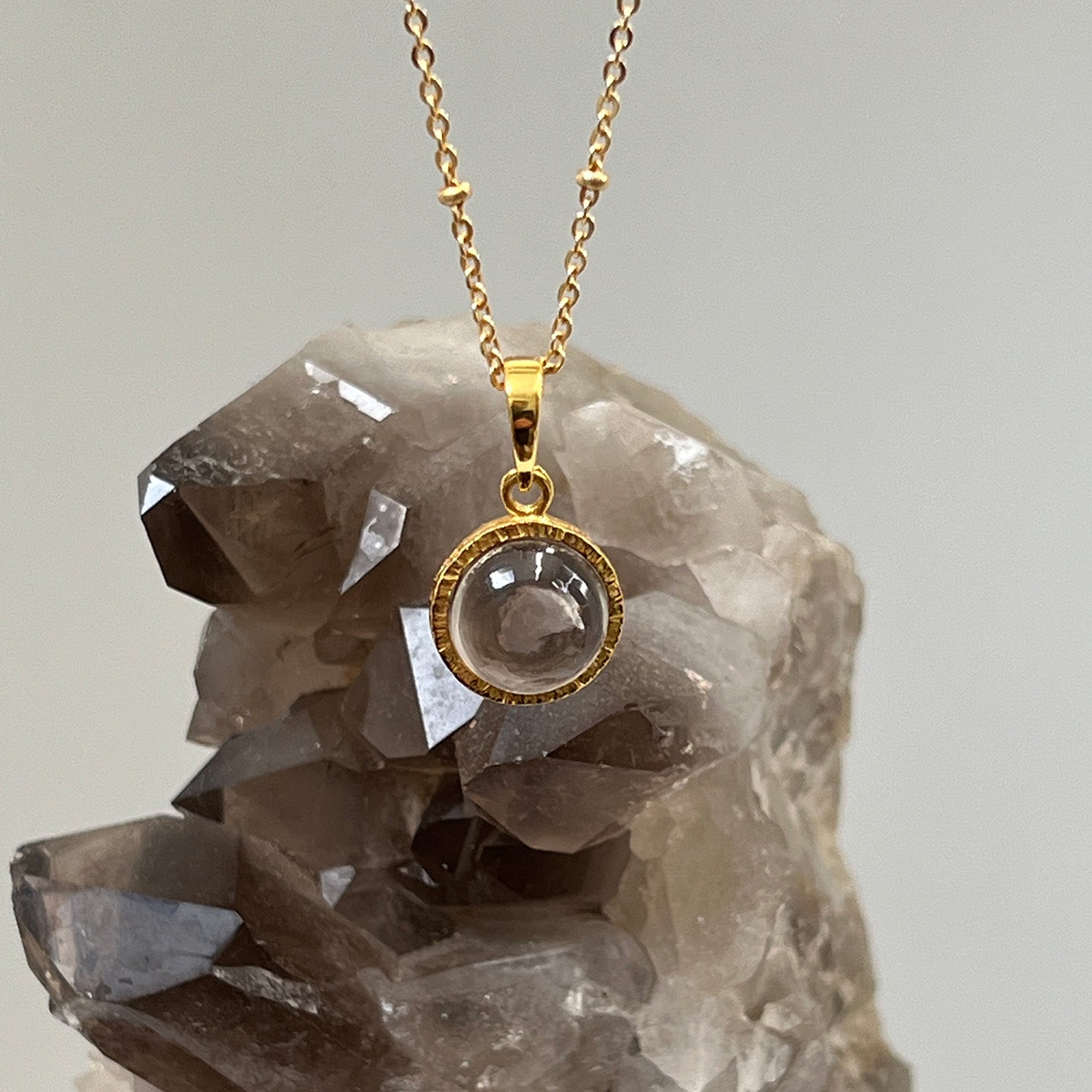 Dunia Smokey Quartz Round Pendant on Short Satellite Chain