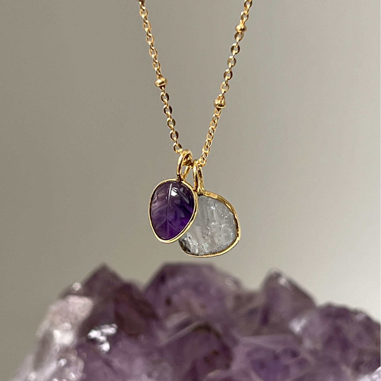 Freeform Celestial Duo Raw Aquamarine Slice with Amethyst Carved Leaf Pendant