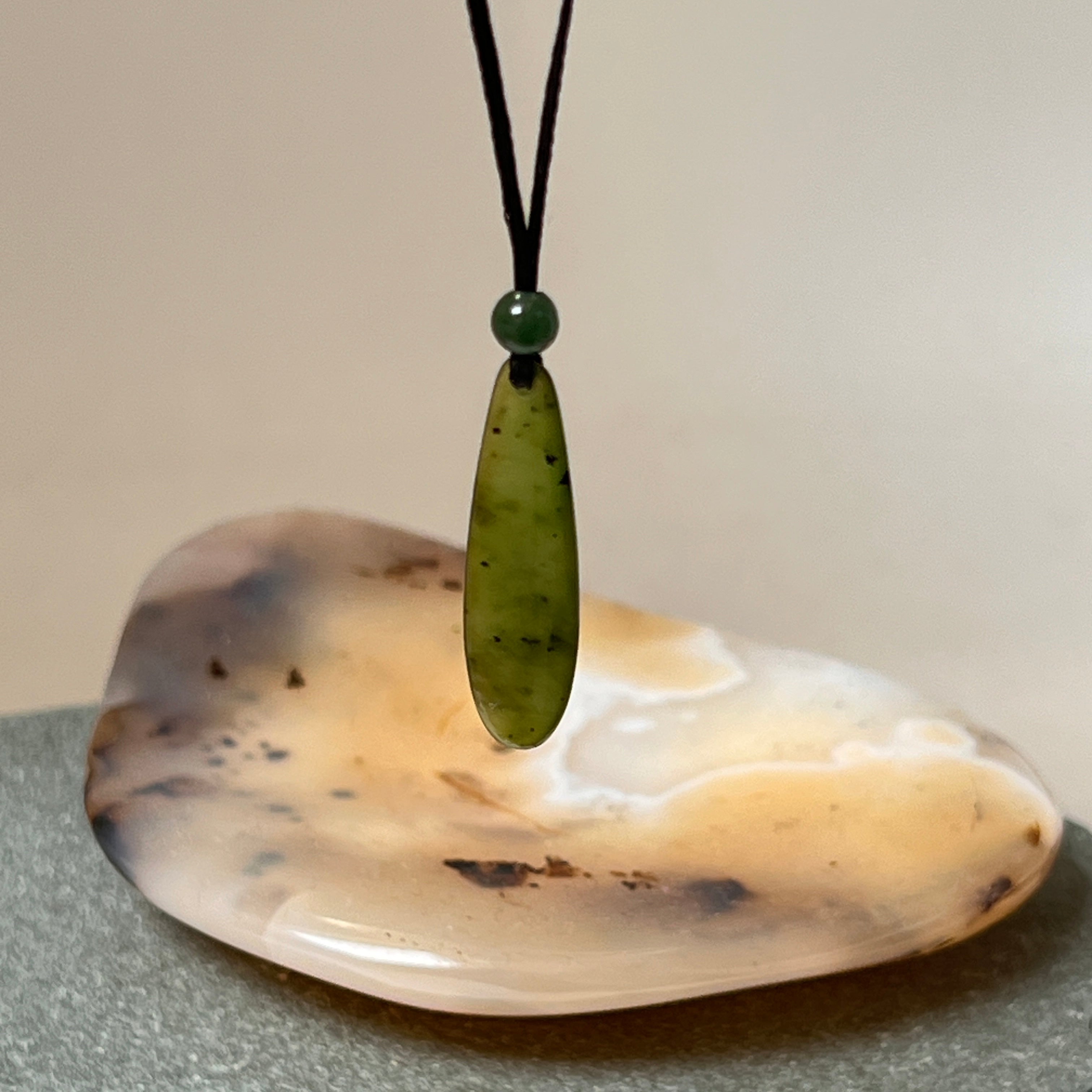 Small Alaskan Jade With A Jade Bead On Adjustable Cord