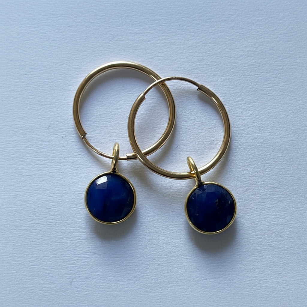 Gold Fille creole with astro sapphire