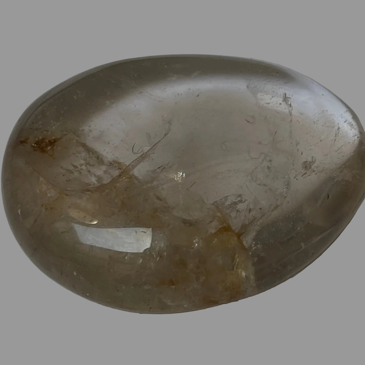Palm stone Rock crystal with golden healer inclusions