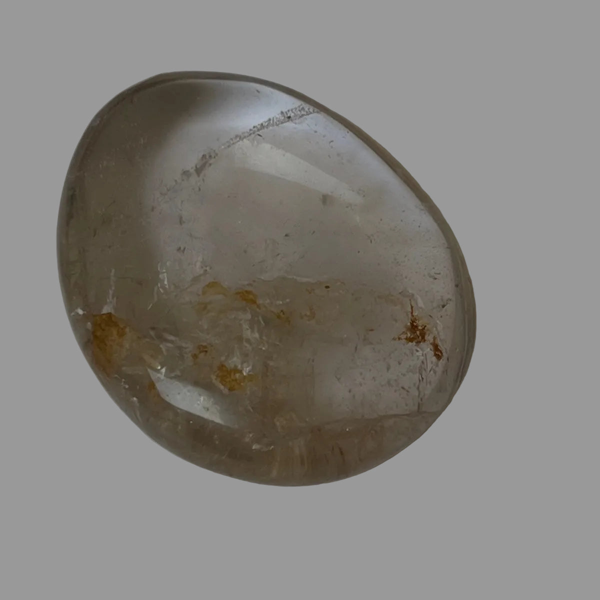 Palm stone Rock crystal with golden healer inclusions