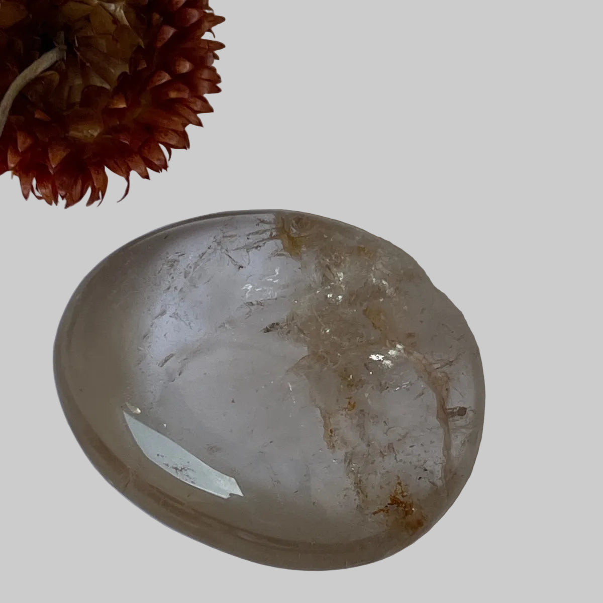 Palm stone Rock crystal with golden healer inclusions