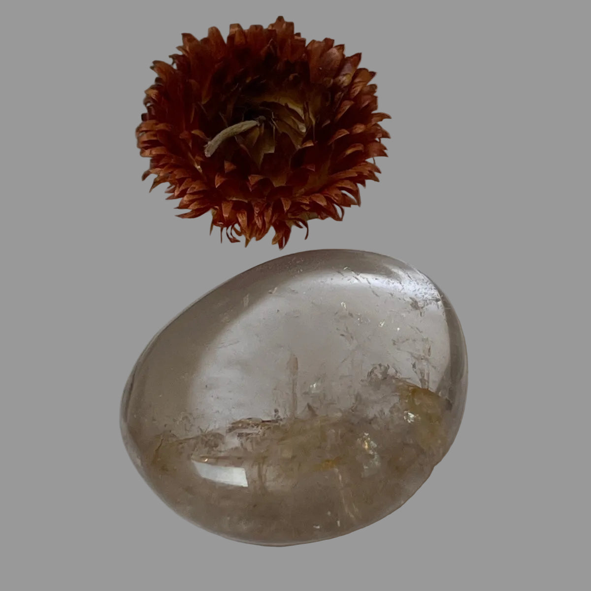 Palm stone Rock crystal with golden healer inclusions