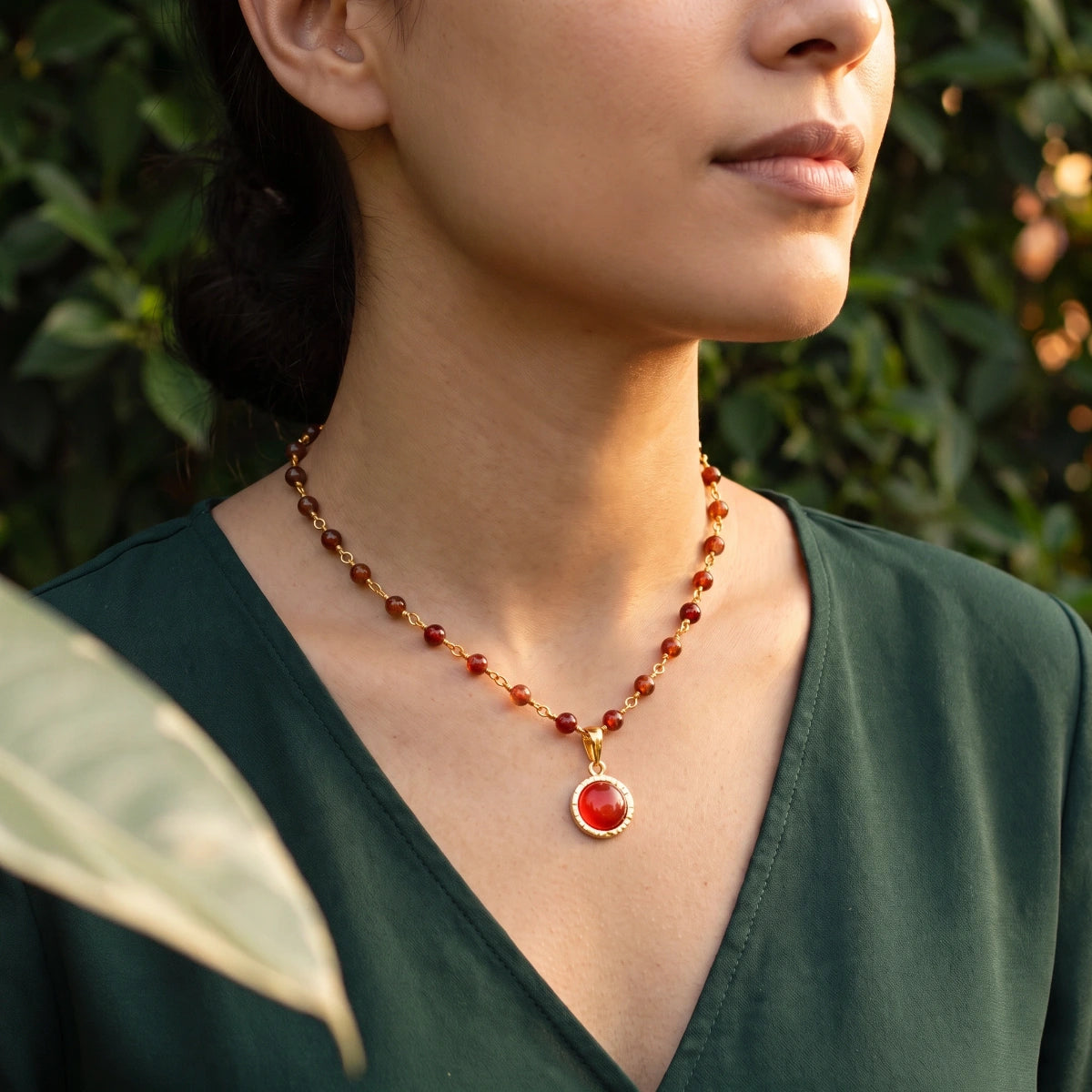 Dunia Red Onyx Round Pendant On Garnet Rosary