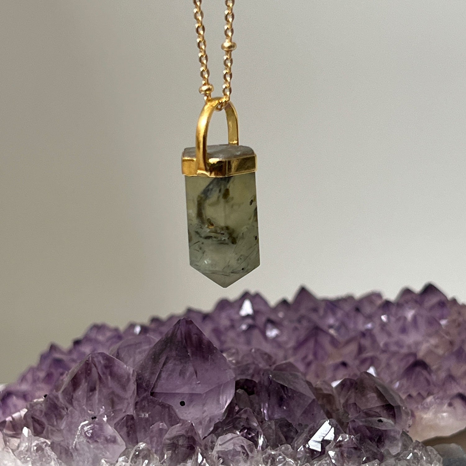 Green Prehnite Point on Long Satellite Chain