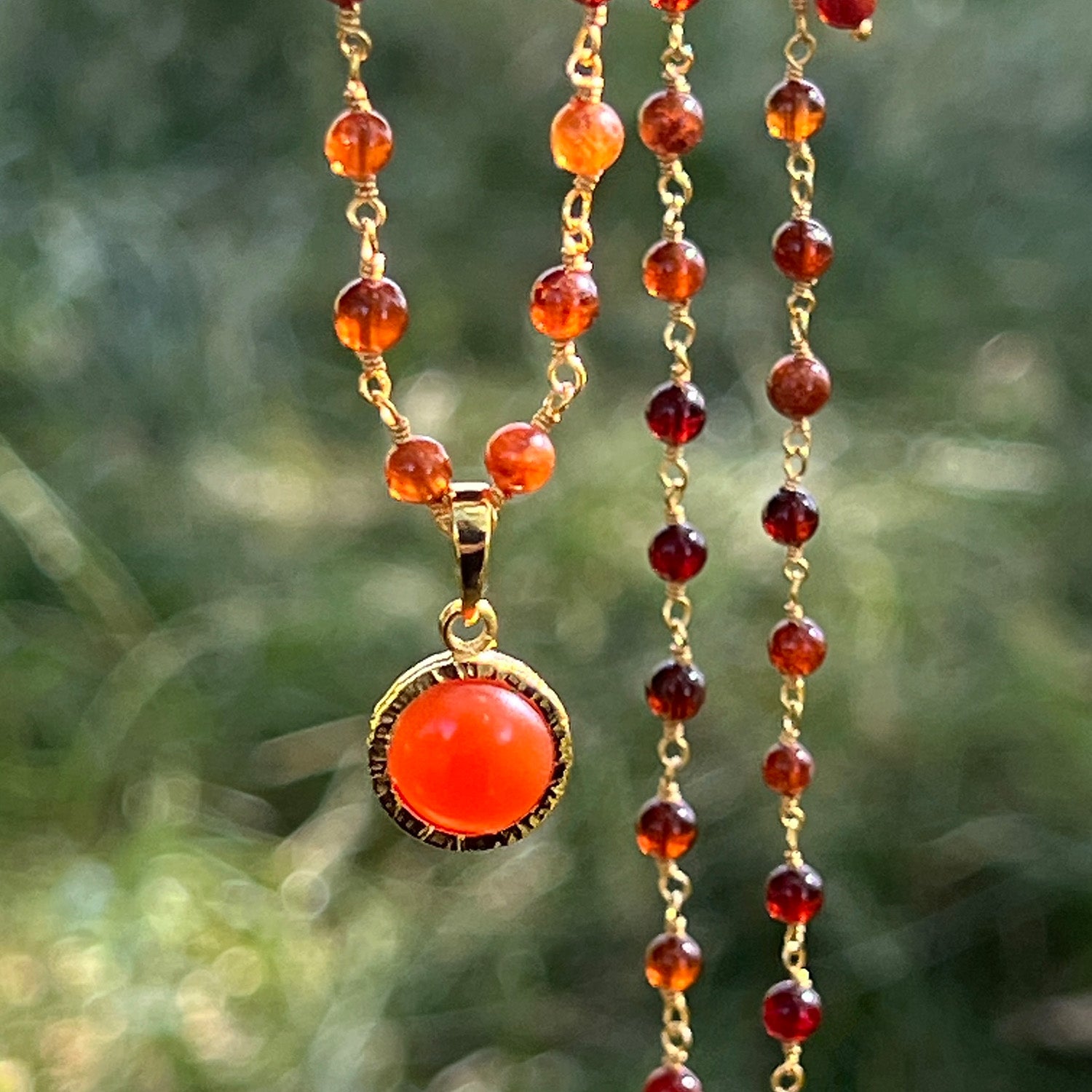Dunia Red Onyx Round Pendant On Long Hessonite Garnet Rosary