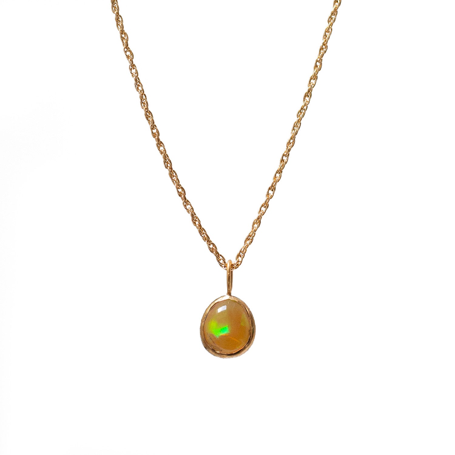 Small Freeform Ethiopian Opal With Green Reflection On 9ct Gold Chain
