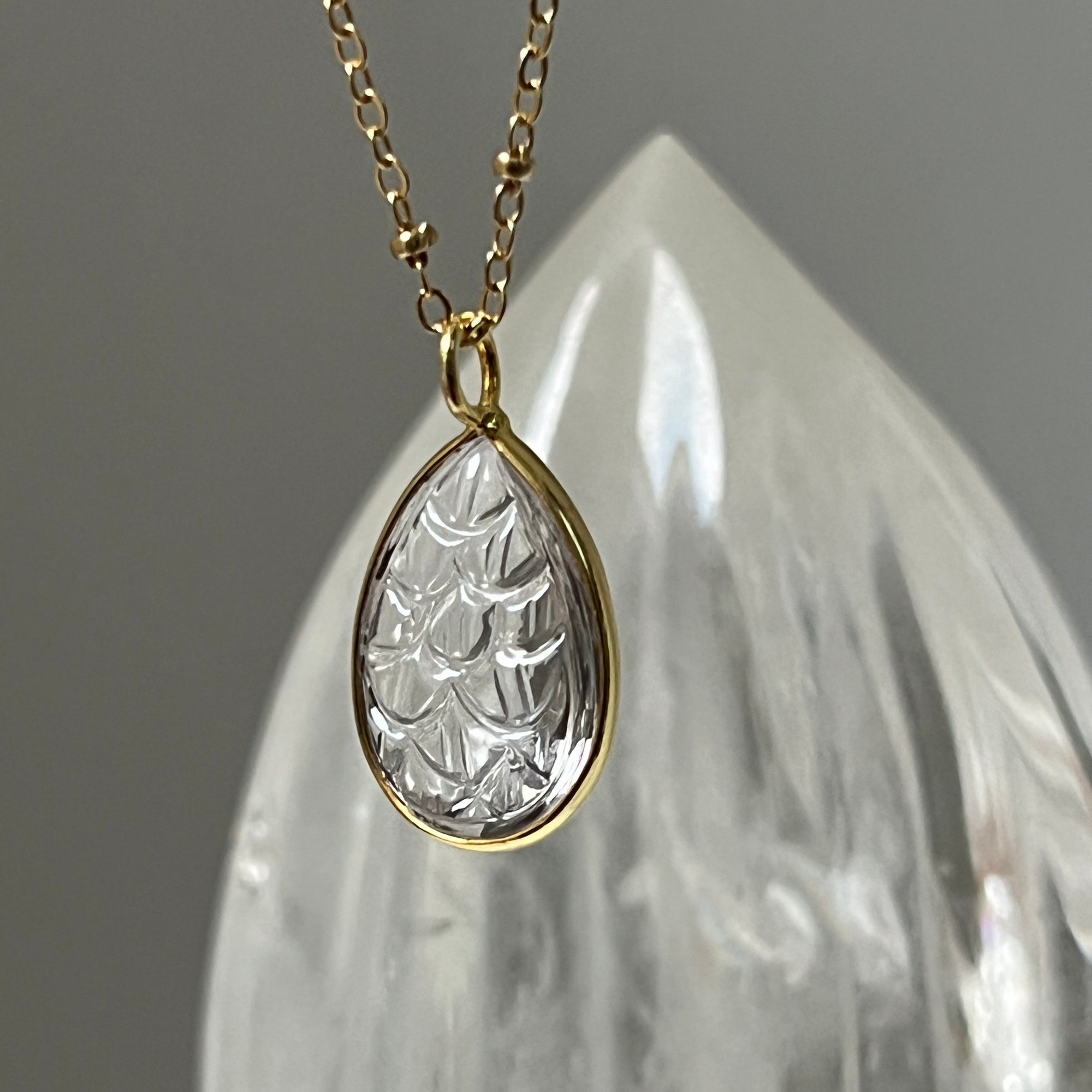 Carved Rock Quartz Drop Pendant on Long Satellite Chain