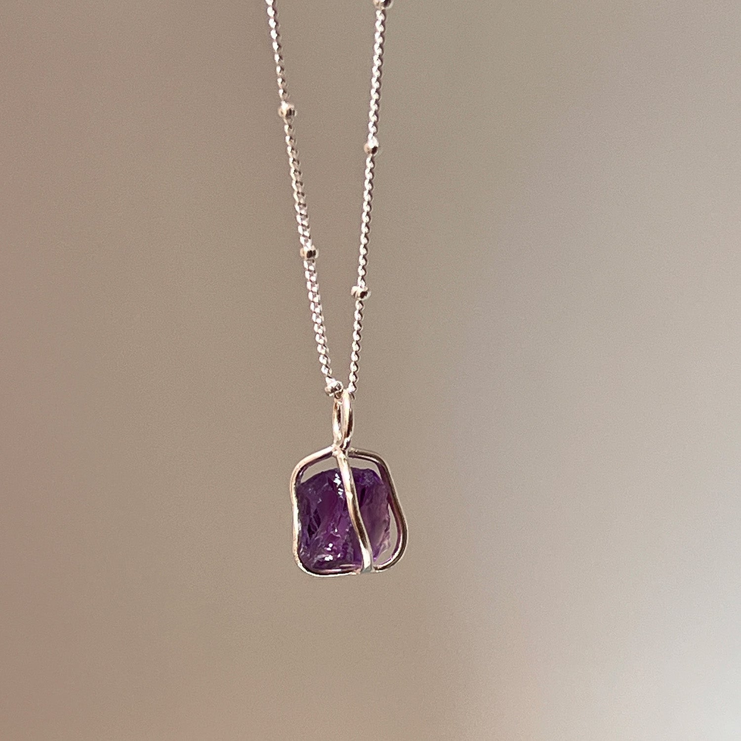 Amethyst Raw in Cage Pendant on Sterling Silver