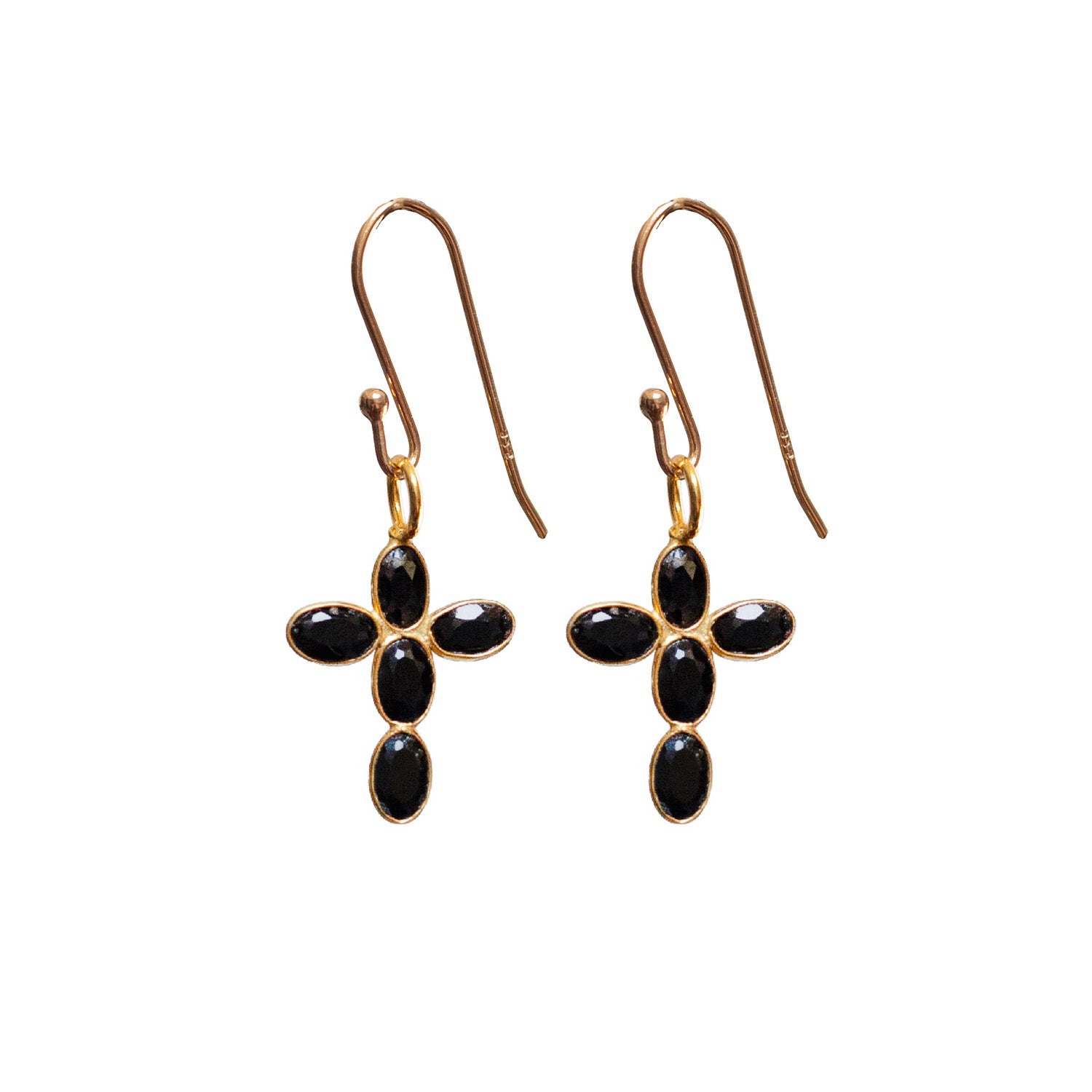 Gold cross-shaped earrings with black onyx stones on a white background