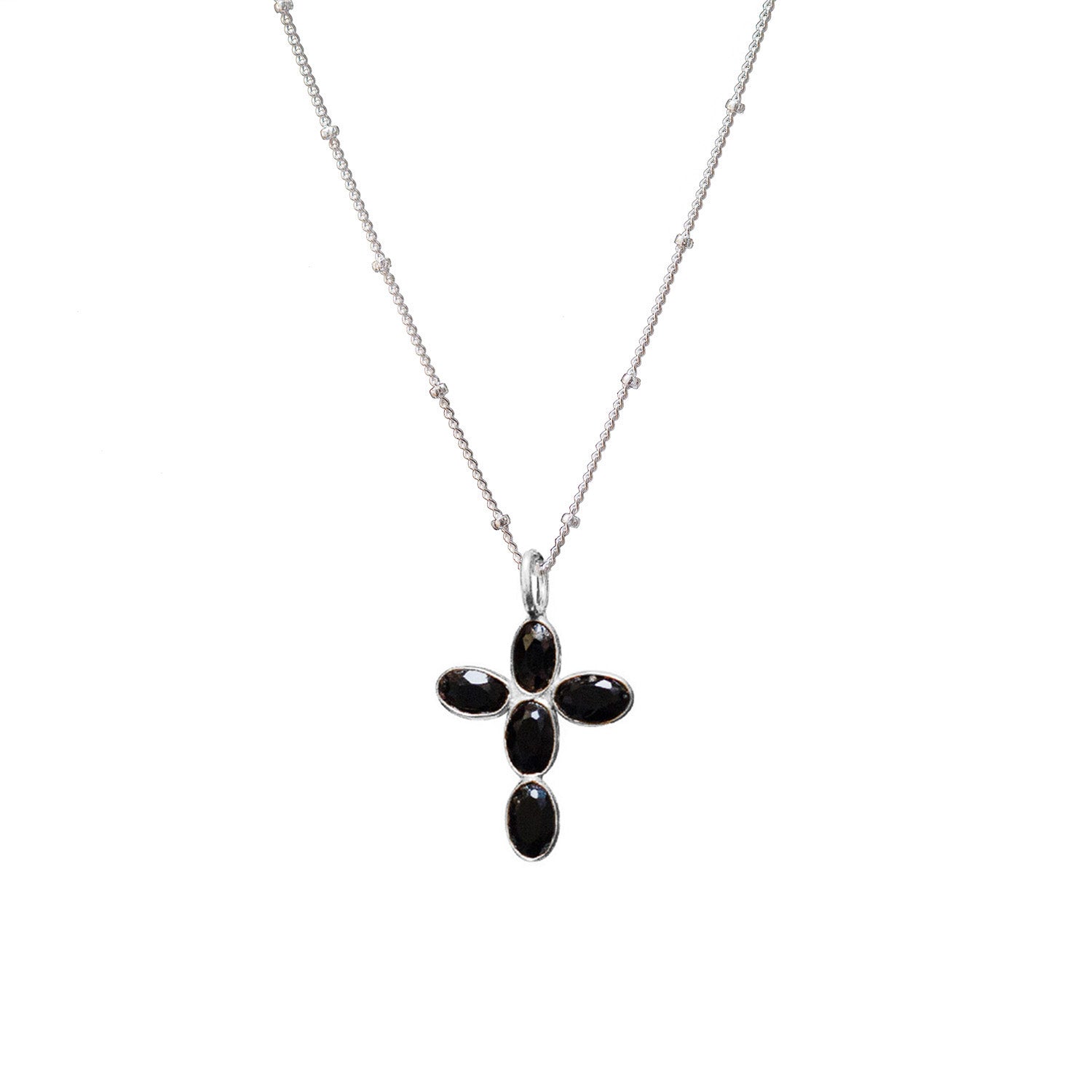 Necklace with a black onyx cross pendant on a white background