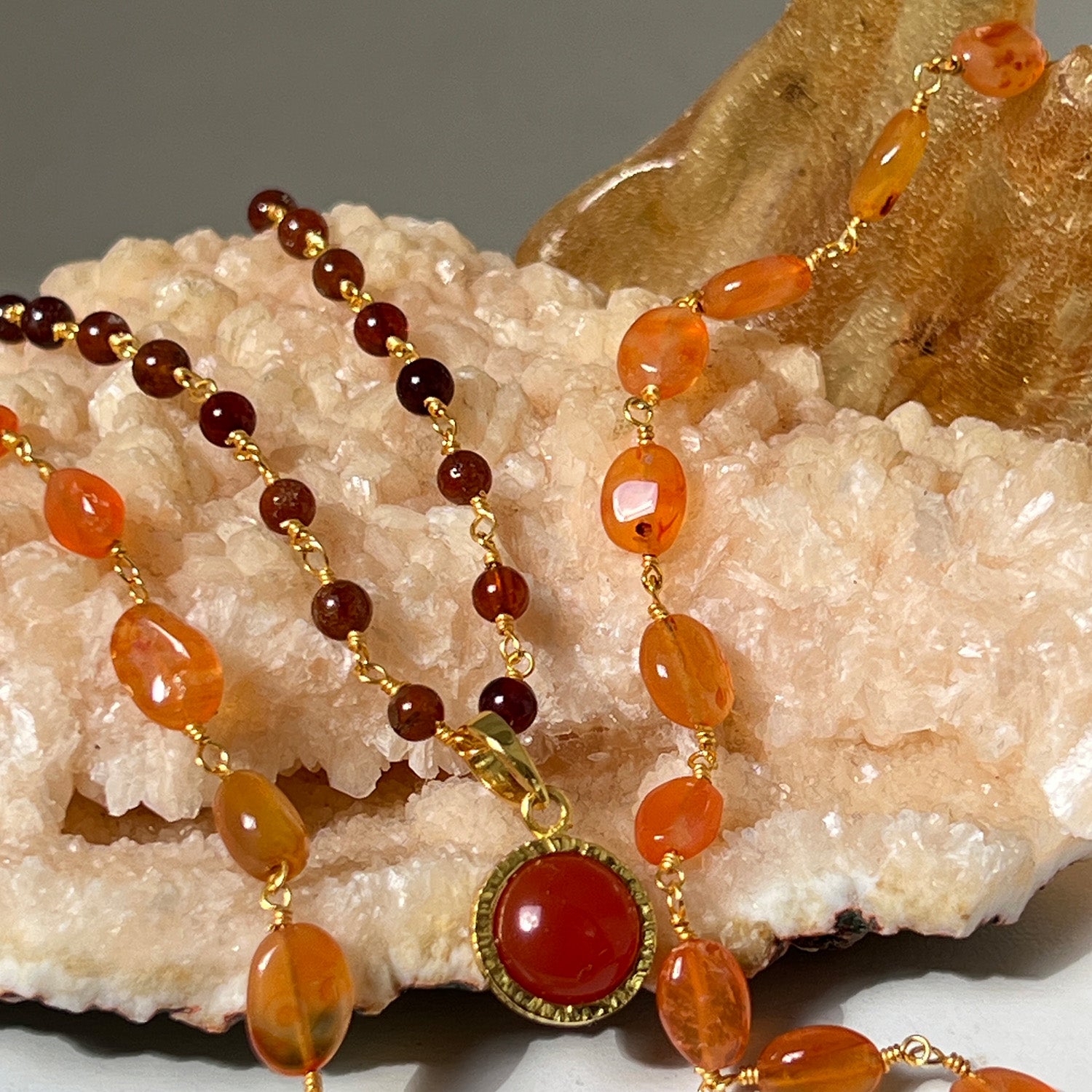 Dunia Red Onyx Round Pendant On Long Hessonite Garnet Rosary
