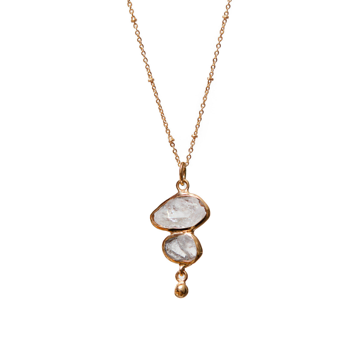 Necklace with a pendant featuring two clear stones on a white background