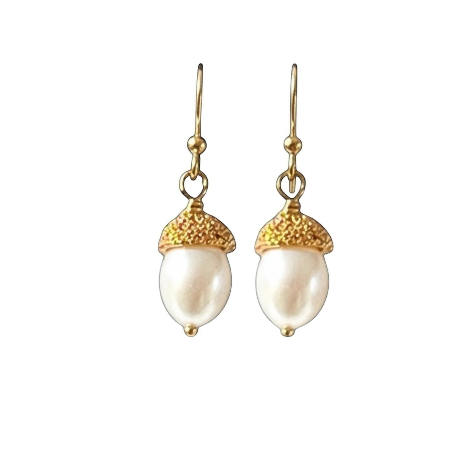 Mirabelle Jewellery acorn freshwater pearl drop earrings with granulated gold-tone caps.