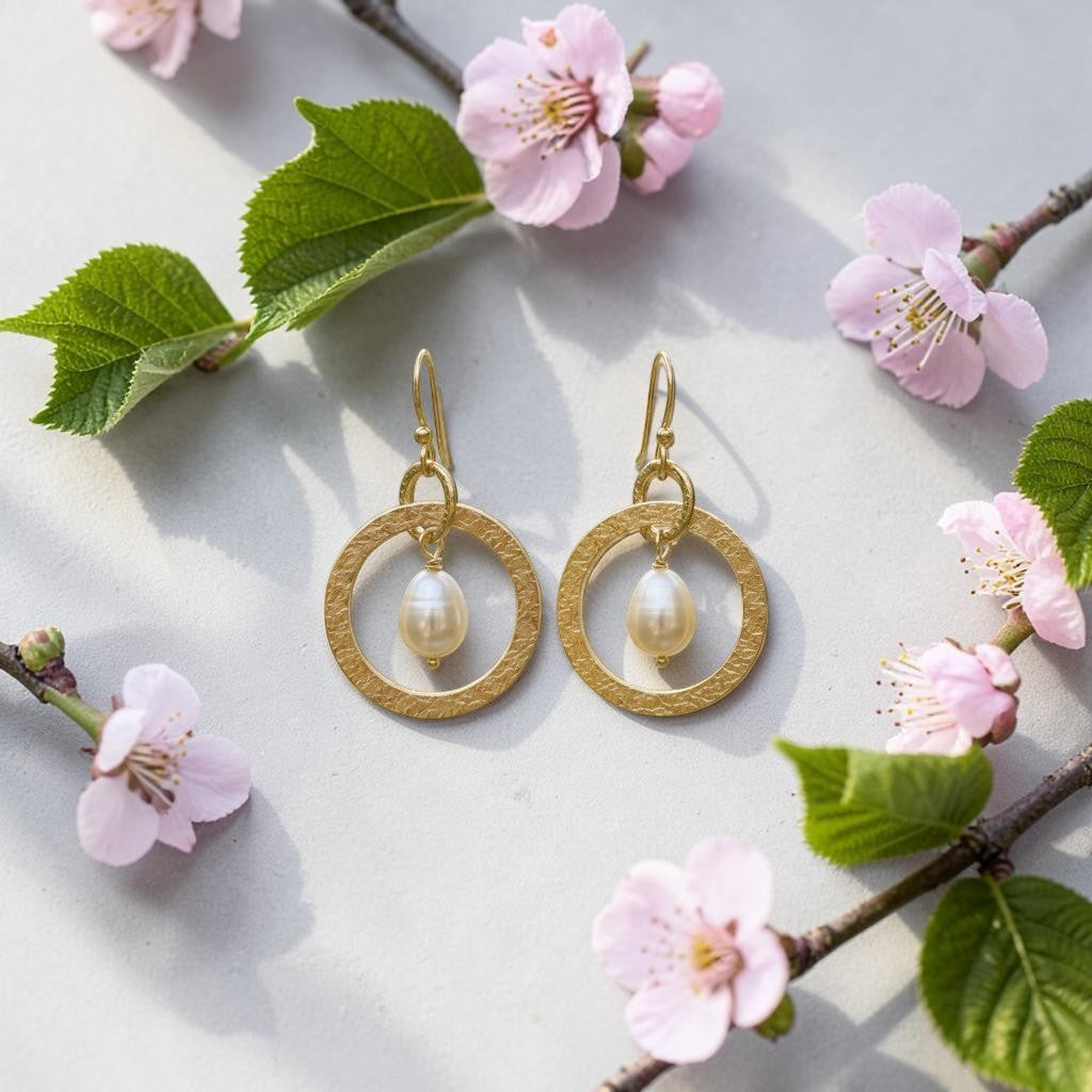 Mirabelle Jewellery gold plated textured hoop earrings with freshwater pearl drops. Handmade in London.