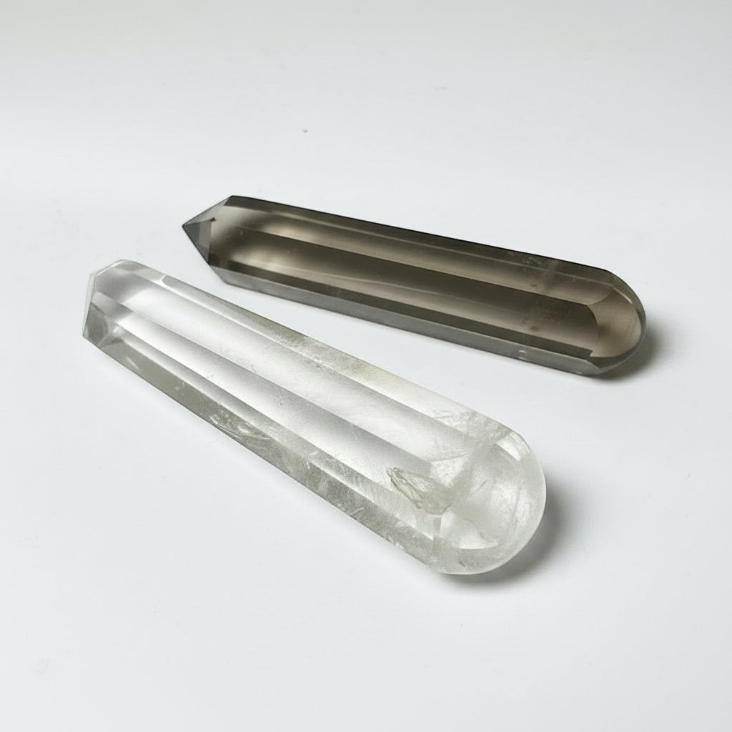 Mirabelle Jewellery crystal wands from Madagascar, featuring a clear rock crystal and a light smoky quartz point.
