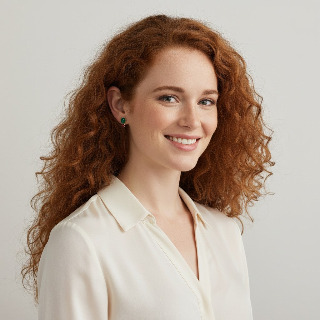 Model wearing Mirabelle Jewellery Manis two-stone green and red onyx earrings in 22ct gold plated sterling silver.