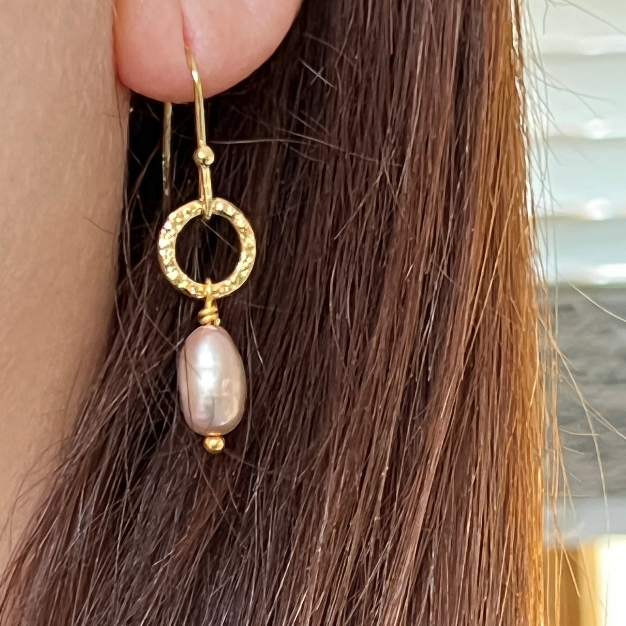 Mirabelle Jewellery small baroque pink pearl drop earrings with hammered gold-plated brass hoop and sterling silver hooks.