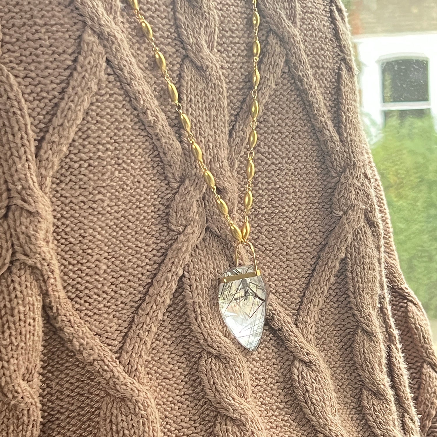 Unique Convex Rutilated Quartz On Long Pepin Chain