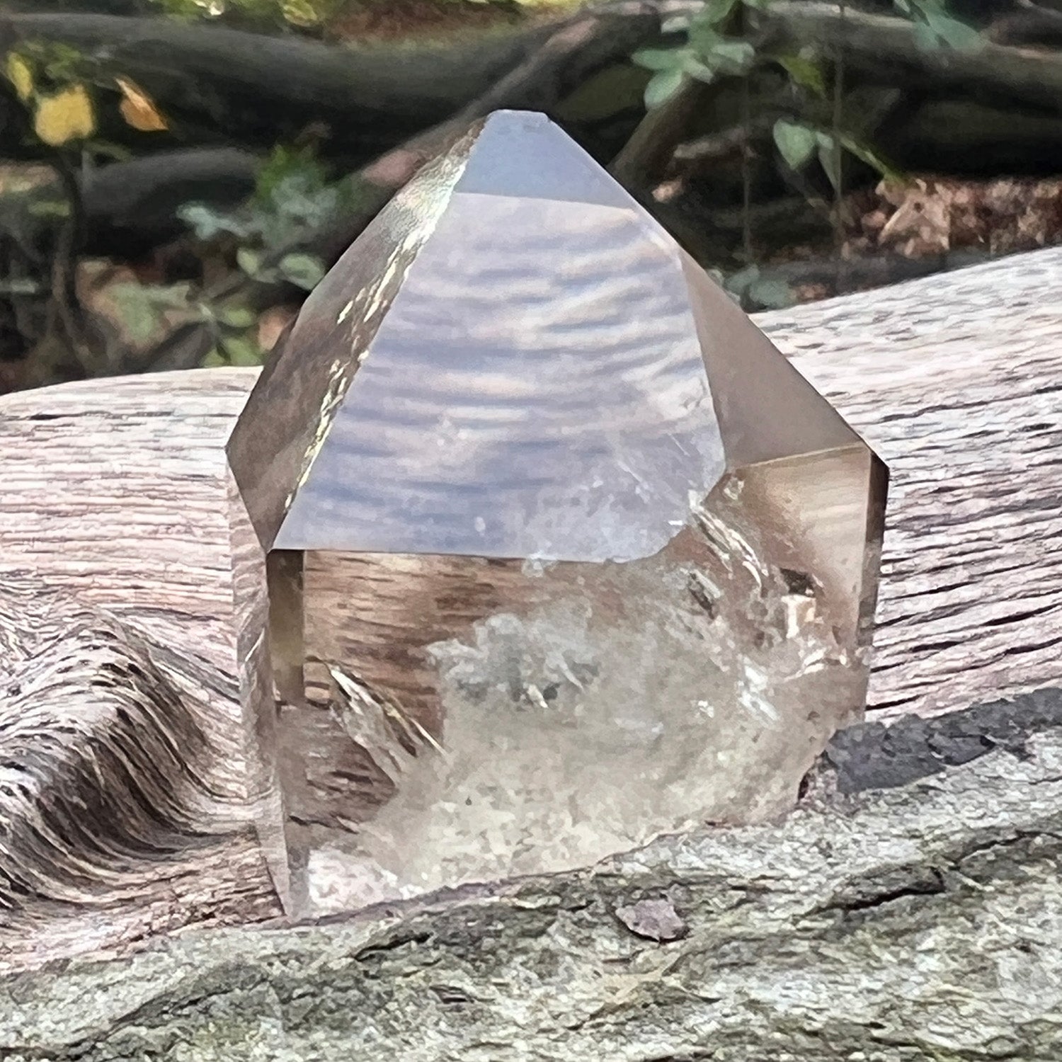 Citrine phantom quartz on a wooden background