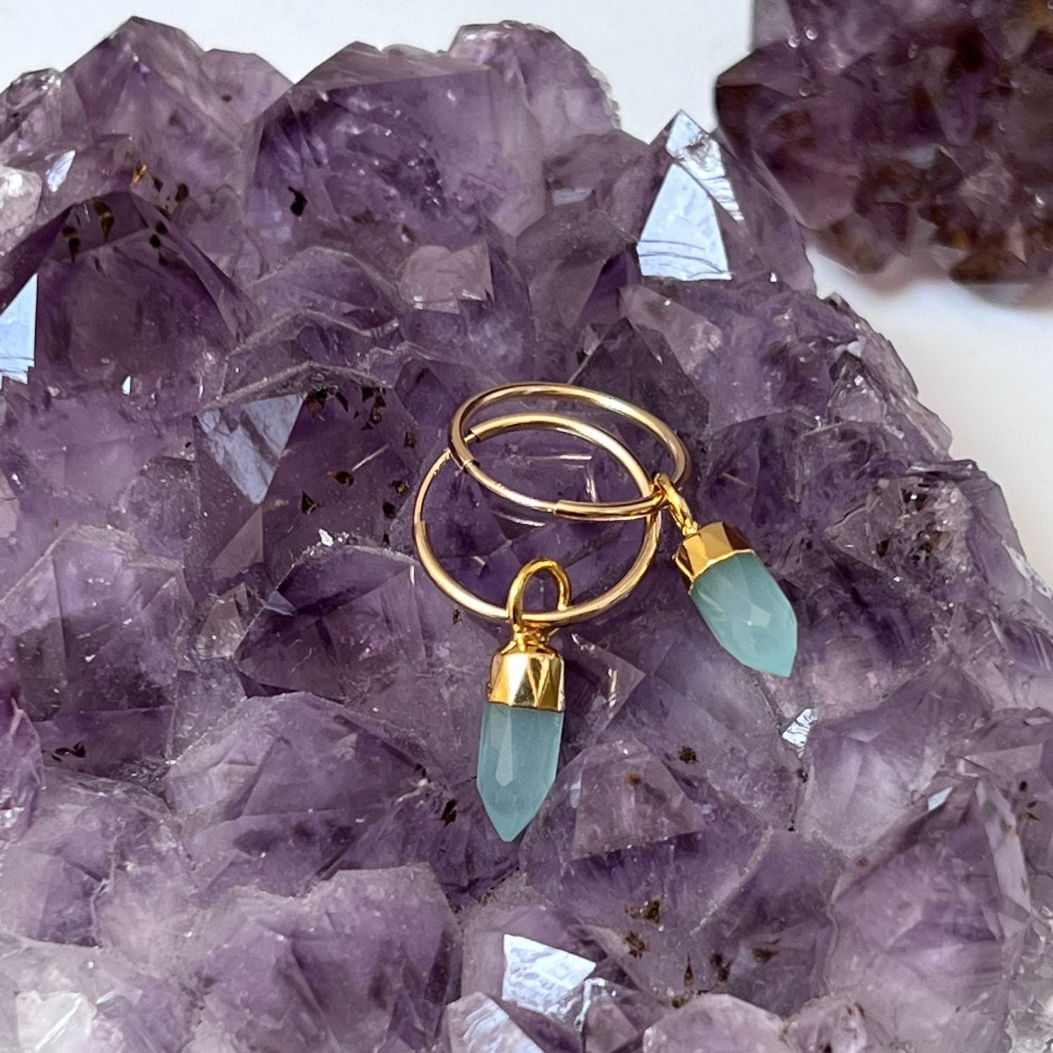 22ct gold-plated aqua chalcedony crystal earrings in a mini point design on a bed of crystals