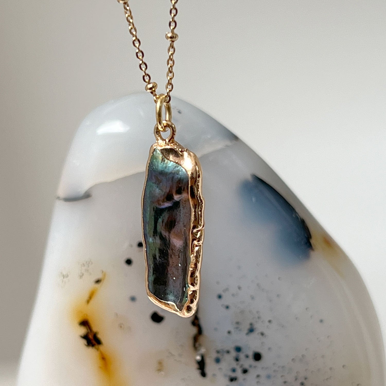 Biwa pearl iridescent pendant on long satellite chain