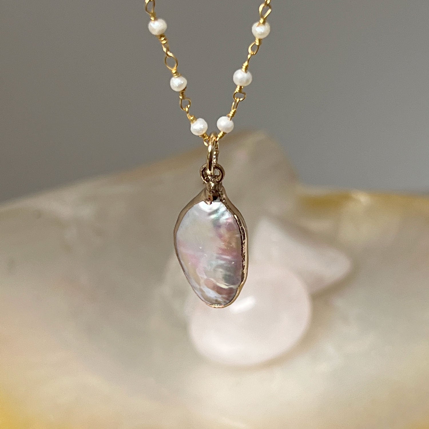 Pearl Rosary with freeform white iridescent baroque freshwater pearl bezel pendant