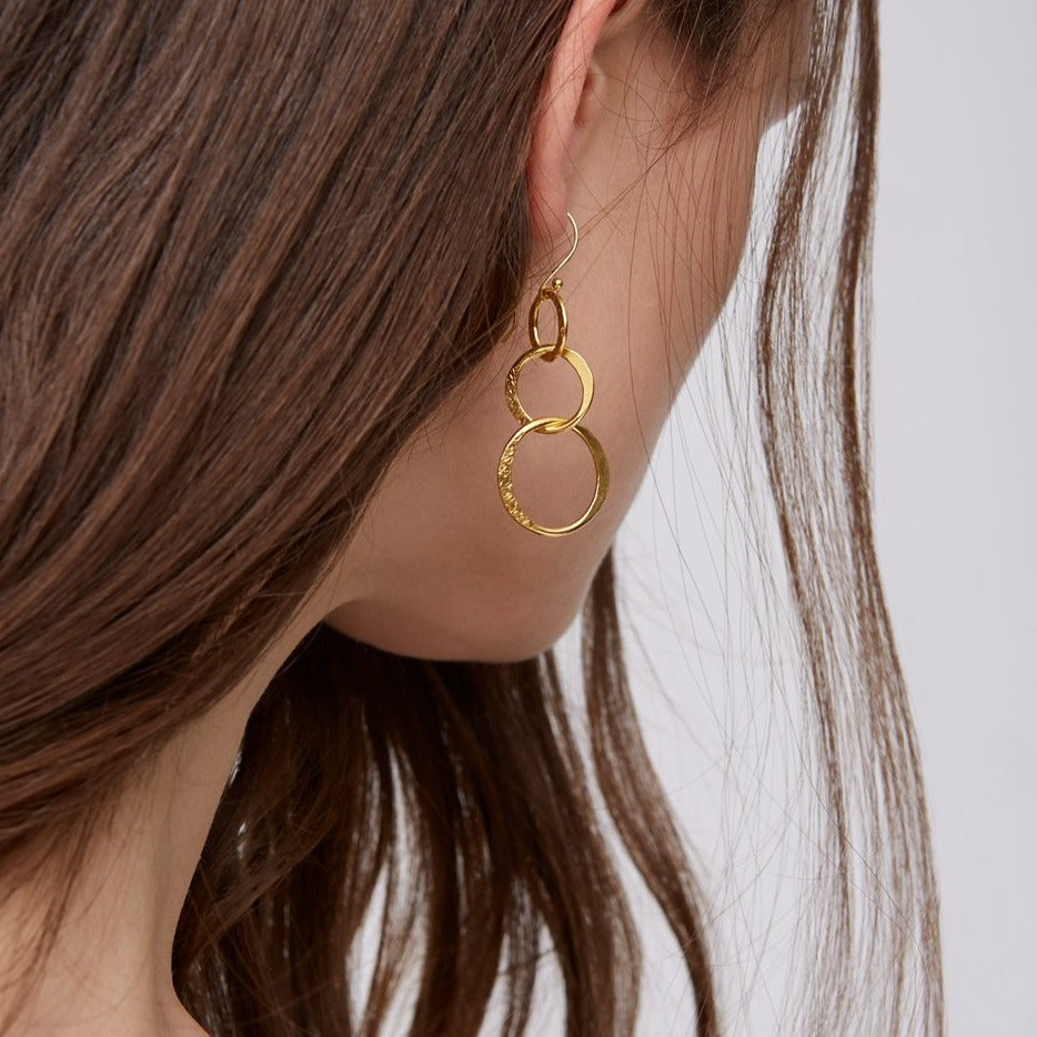 Gold Plated Lolita Loop Earrings worn on a model