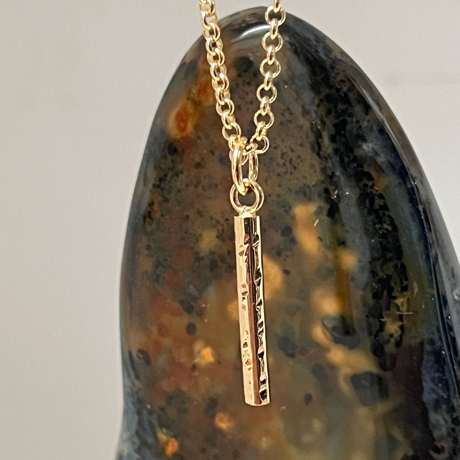 Long Hammered Bar Pendant on Baby Belcher