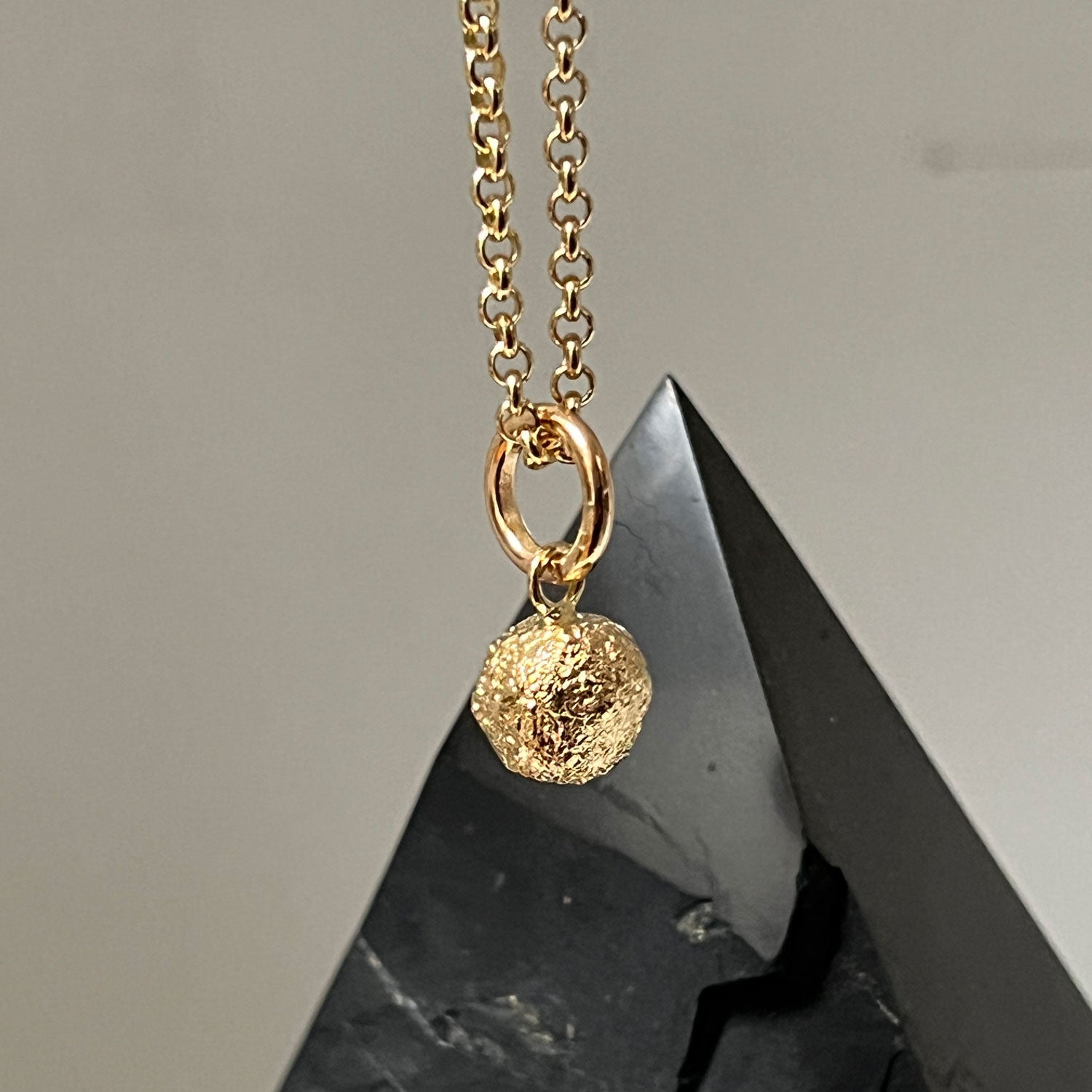 Pebble Rough Pendant on Baby Belcher