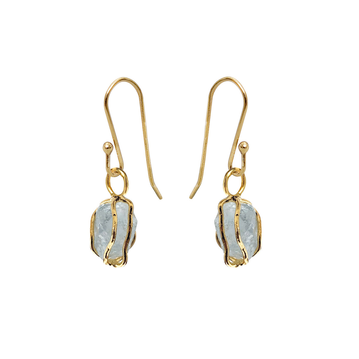 Raw aquamarine drop earrings encapsulated in a gold cage.