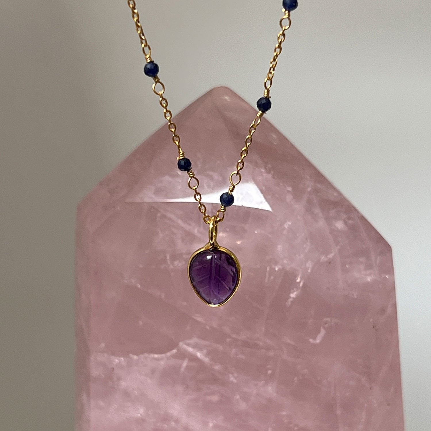 Fancy sapphire rosary with Amethyst carved leaf pendant