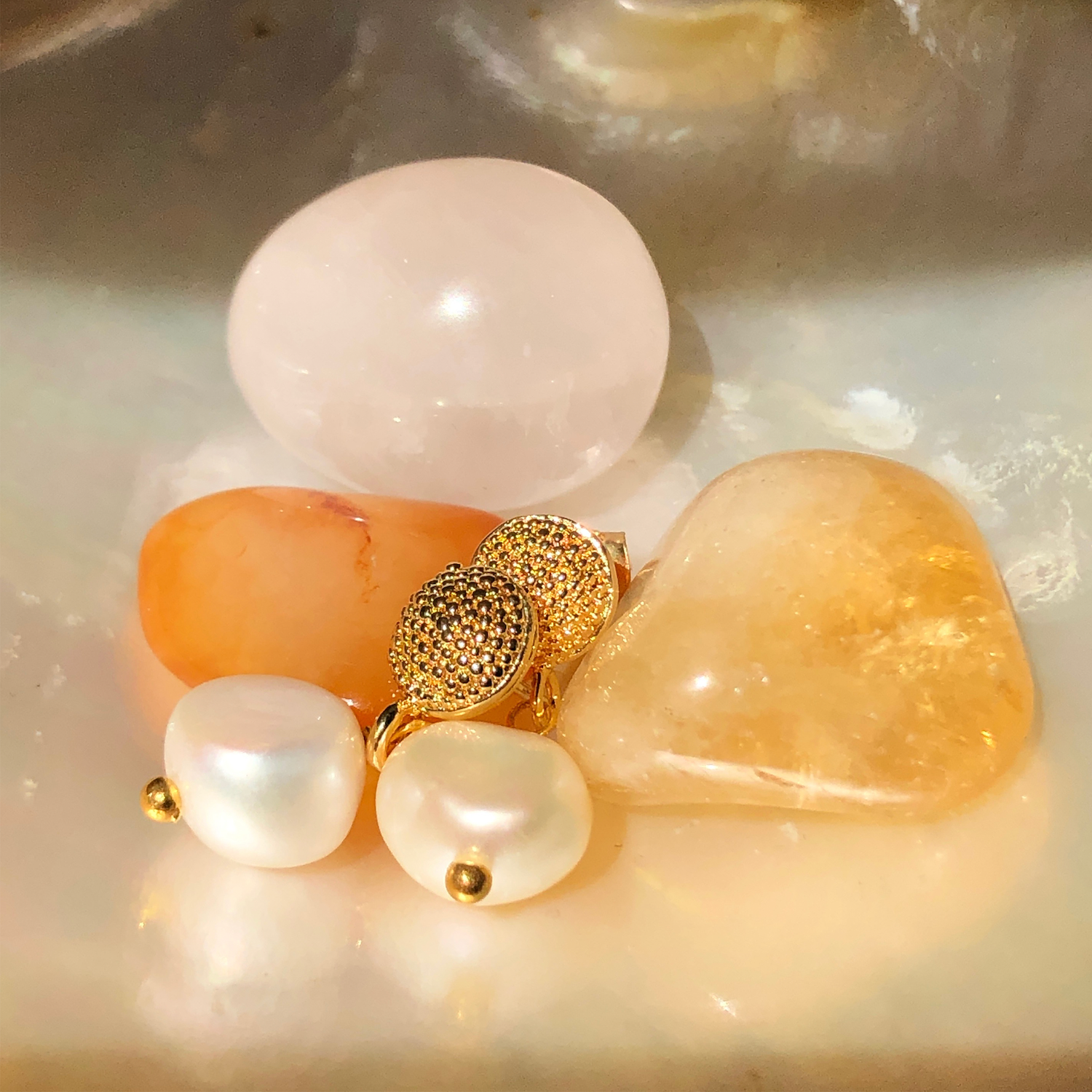 Gold-Plated Studs with Freshwater Pearls on a bed of amber crystals