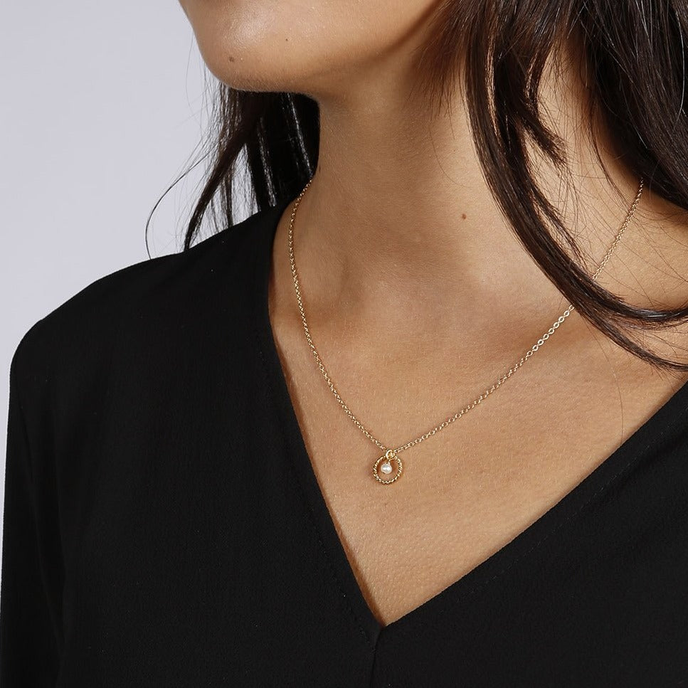 Alexis Freshwater Pearl Necklace worn by a model wearing a black top