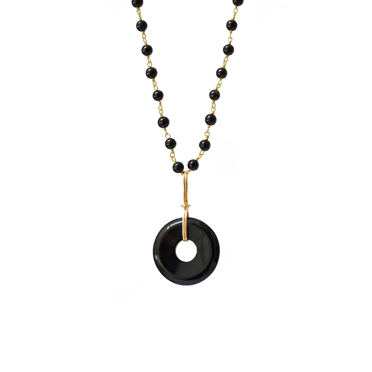 Grounding black onyx disc on short black onyx rosary or Belcher chain