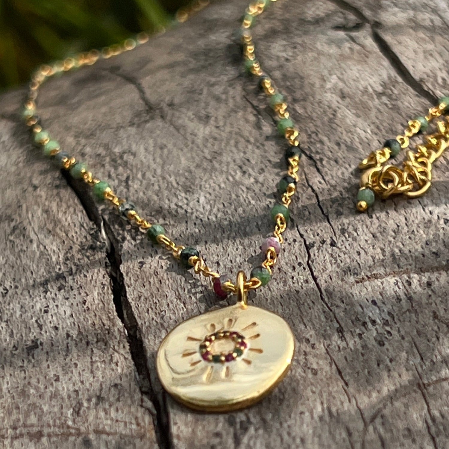 Sun Medal with Multi Coloured Zircons