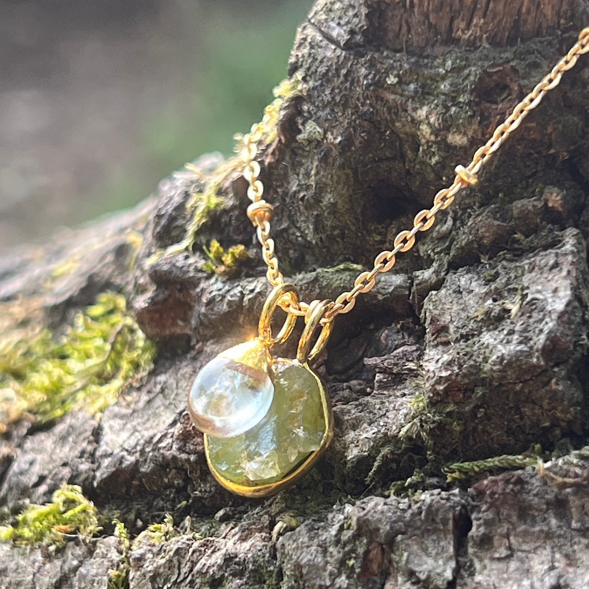 Freeform Raw Peridot slice with Smooth Rock Crystal Drop on Satellite chain