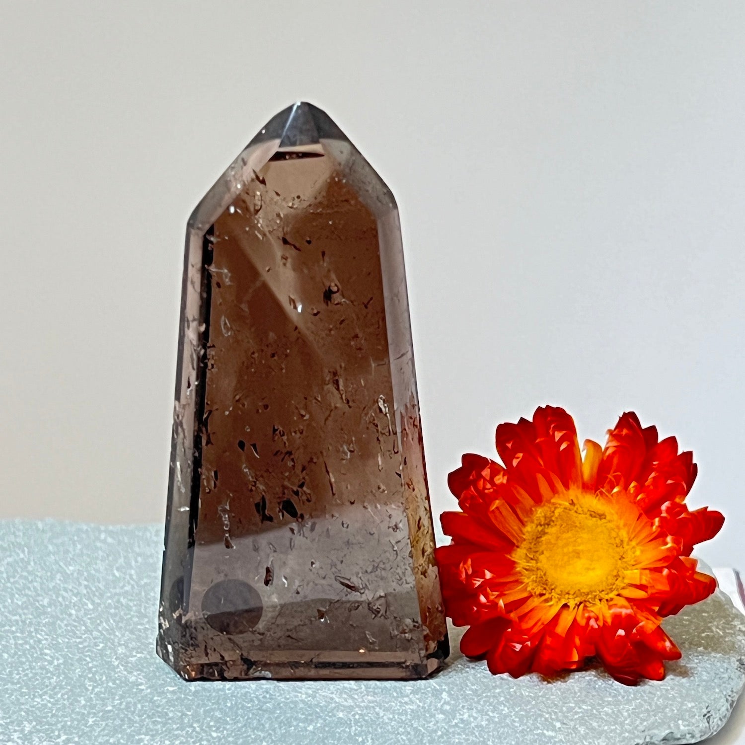 Slim smokey quartz point from Brazil