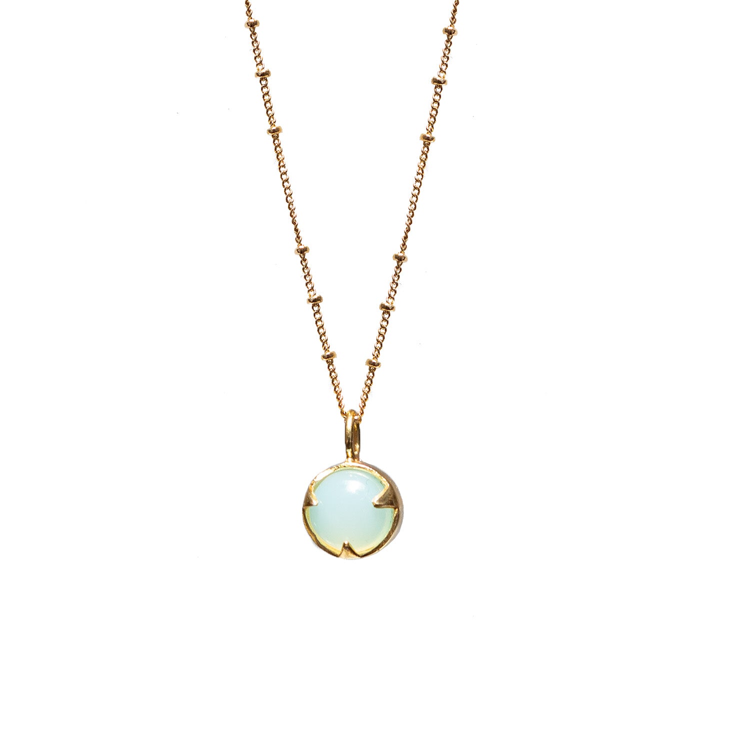 Gold-plated necklace with an aqua chalcedony pendant on a white background