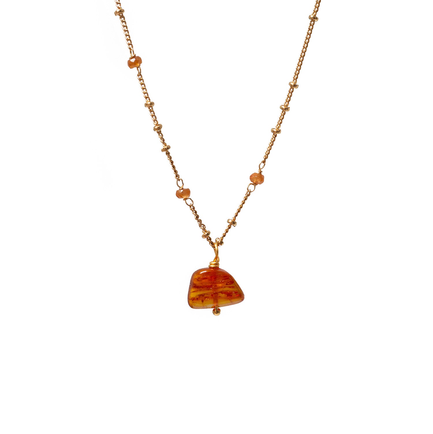 Amber freeform pebble on mini Biba with specitite garnet