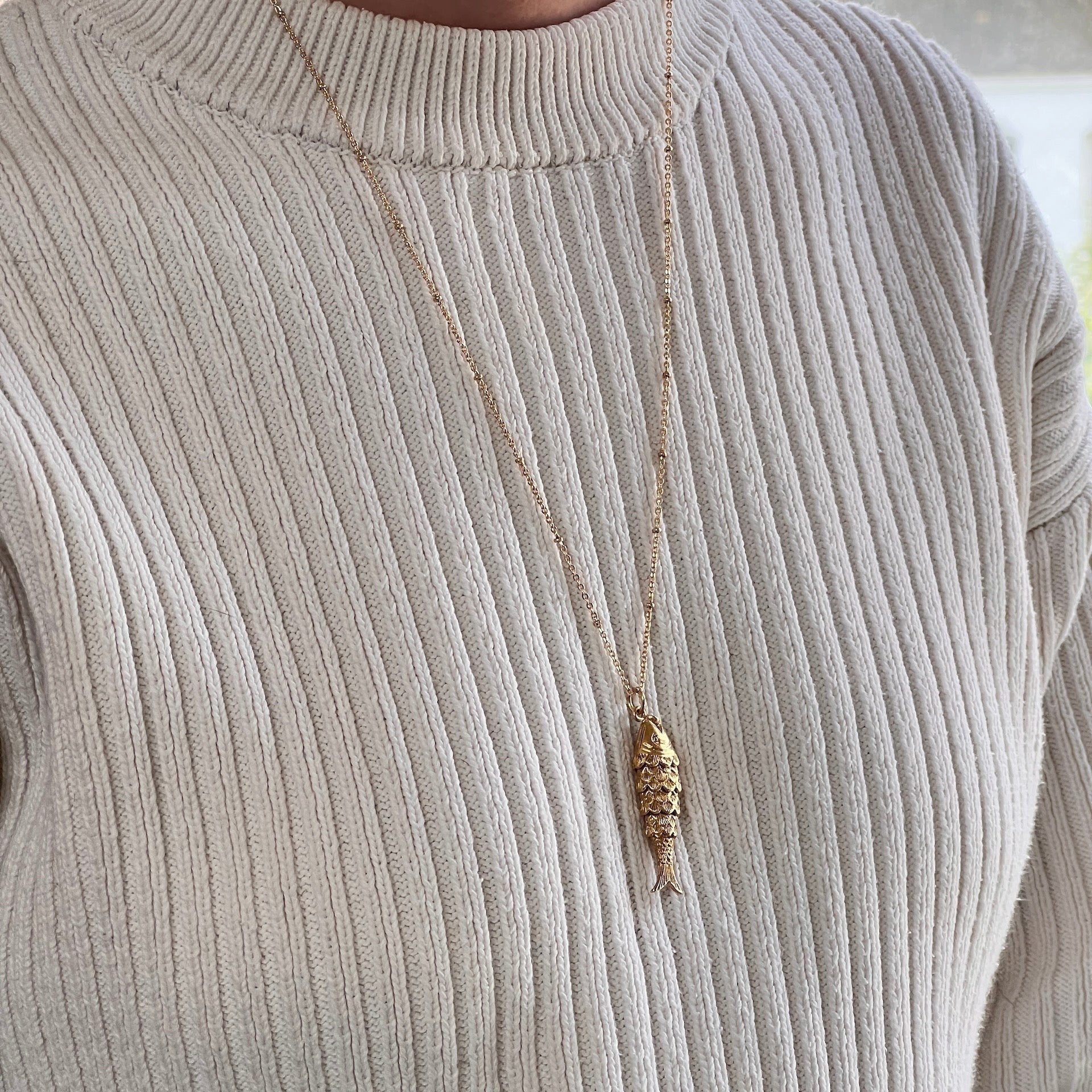Mirabelle Jewellery gold plated recycled brass articulated fish charm necklace on a 60cm satellite chain.