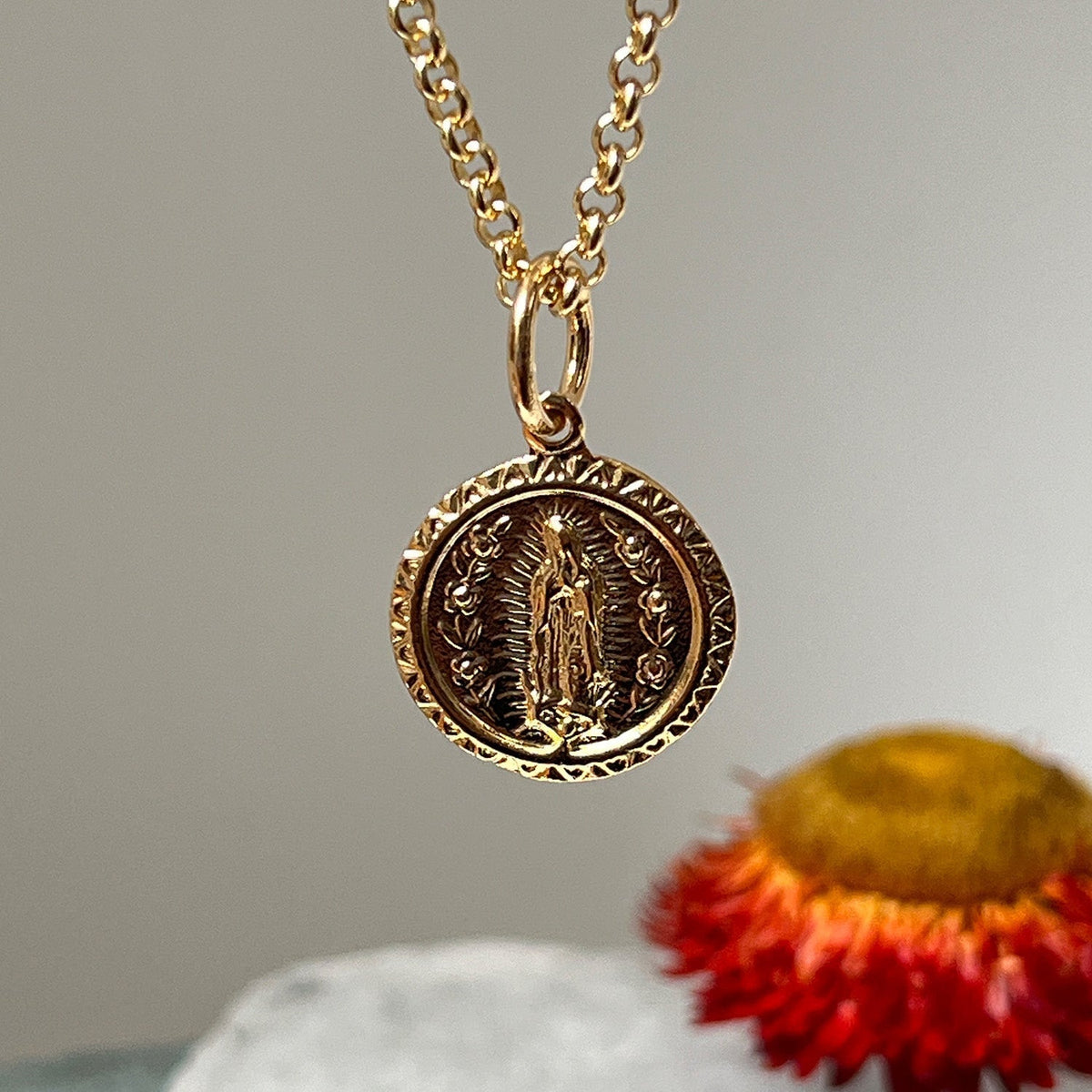 Mirabelle Jewellery gold plated Mary medal pendant on a long baby belcher chain with intricate embossed detailing