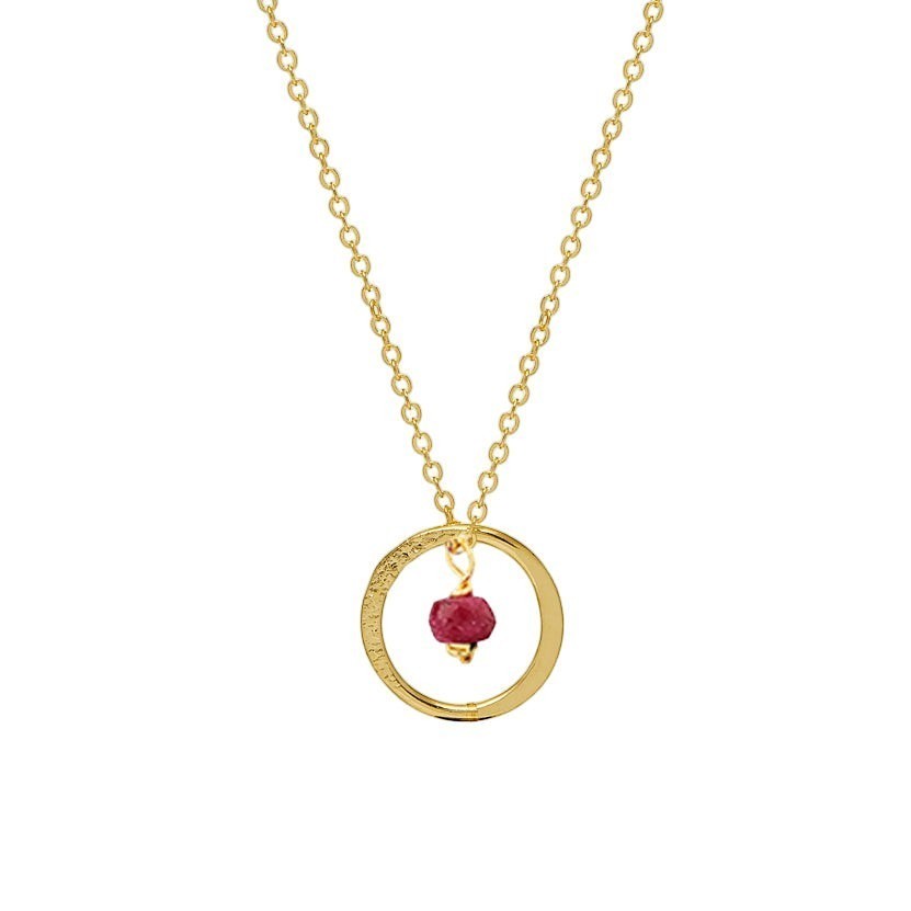 Mirabelle Jewellery Lottie pendant necklace featuring a raw ruby gemstone inside a textured 22ct gold plated circle.